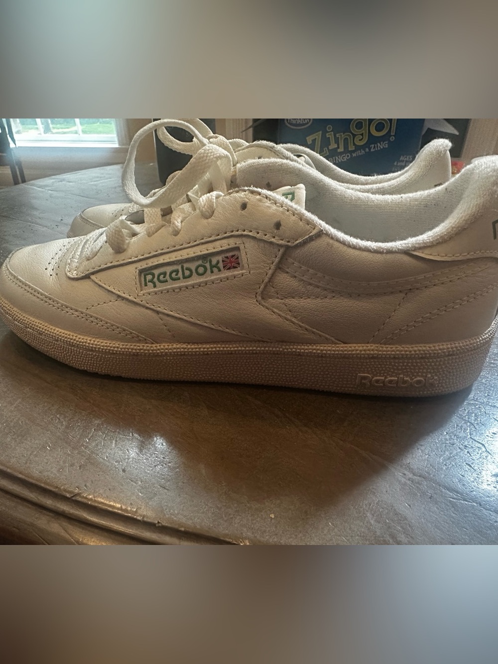Reebok White Low-Top Leather Sneaker with Green Logo Accent